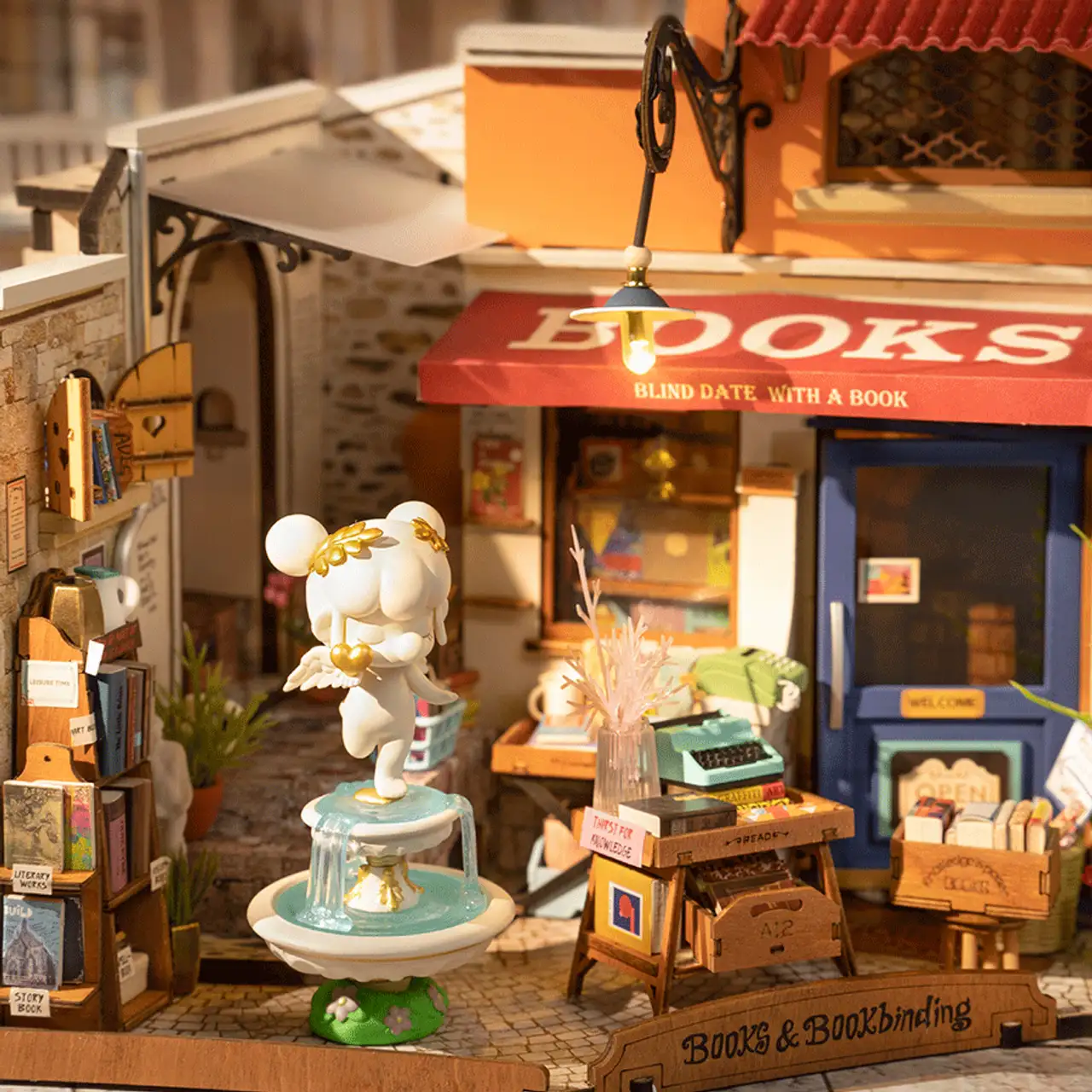 125121-robotime-diy-miniature-kit-corner-bookstore-145-pieces–1.webp
